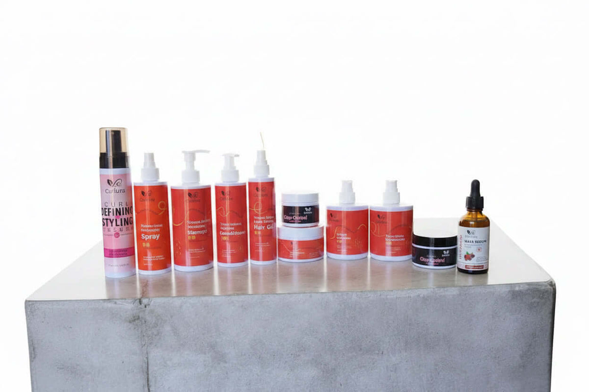 Curlura Complete Curl Care Collection products for curl care routine for curly hair on a concrete surface.